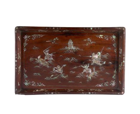 MOTHER-OF-PEARL-INLAID HONGMU TRAY QING DYNASTY, 19TH CENTURY  清 紅木嵌螺鈿四神海鬥圖托盤 raised on four bracket feet, the interior decor