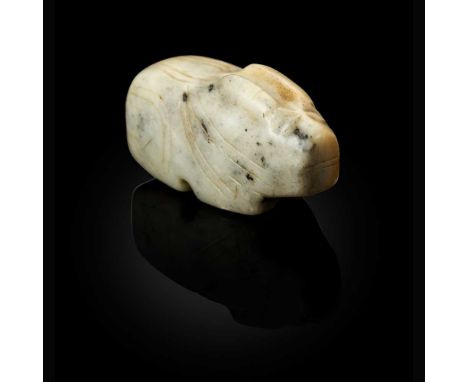 JADE RABBIT NEOLITHIC PERIOD, LIANGZHU CULTURE OR LATER  新石器時代良渚文化或以後 玉兔擺件 of tubular form, simplistically carved with bulgin