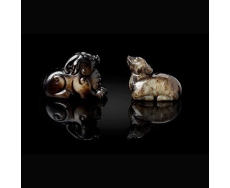 TWO JADE ANIMAL CARVINGS MING DYNASTY, 17TH CENTURY  明 青玉提油雕麒麟及幼鹿（共兩件） one carved in the form of a seated mythical animal qil