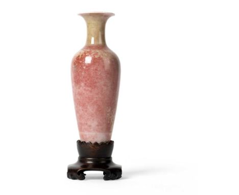 PEACH-BLOOM-GLAZED VASE KANGXI MARK  康熙款 豇豆紅釉觀音瓶 帶木座 the elongated conical body surmounted with a waisted neck terminating to