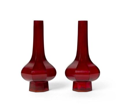 PAIR OF OCTAGONAL RUBY-RED GLASS VASES QING DYNASTY, 19TH CENTURY   清 紅料八稜瓶（一對） each of octagonal form, supported on a tall f