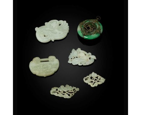GROUP OF SIX JADE ORNAMENTS    各式玉雕（共六件） comprising: three reticulatedly carved jade ornaments, respectively in sanduo (finge