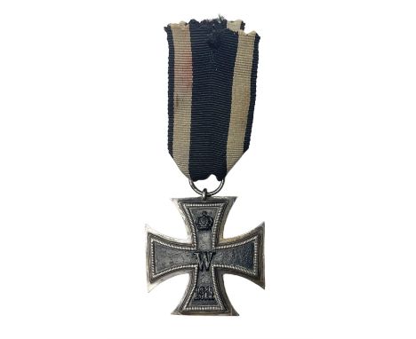 WW1 German Iron Cross 2nd Class with ribbon; ring indistinctly stampedCondition Report:Grubby consistent with age and use.Tra