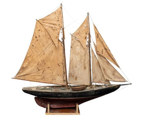 An early 20th century scale model pond yacht of the Nova Scotia fishing and racing  gaff rigged schooner 'Bluenose': fully ri