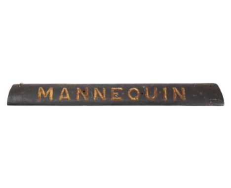 The wooden sternboard name from the Brixham Trawler BN18 'Mannequin':, with gilt carved letters 12 x 104cm.* Notes- Built as 