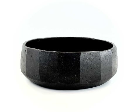 Janet LEACH (1918-1997)A St Ives Leach Pottery black stoneware cut sided bowl with tenmoku glazed interior, impressed persona