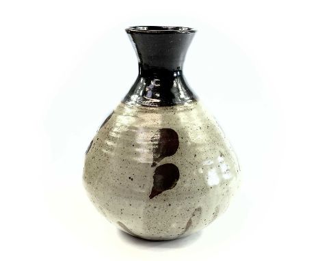 Janet LEACH (1918-1997)A St Ives Leach Pottery stoneware bottle vase, the body with speckled oatmeal glaze and iron brushwork