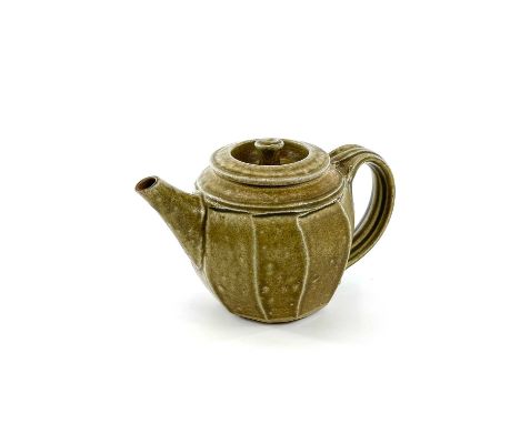 Richard BATTERHAM (1936-2021)Studio pottery teapotH14 x W21cmChip to the spout of the pot, along with a crack to the top of t