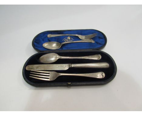 An S.H. and Gass Christening set consisting of knife, fork and spoon together with a further fork and spoon 