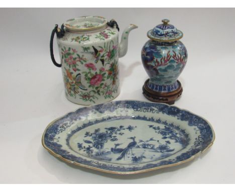 A Chinese famille rose teapot, Nanking blue and white plate and enamel vase, cover and stand