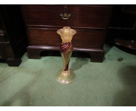 A Venetian style glass candlestick with red glass swirl decoration, 36cm tall