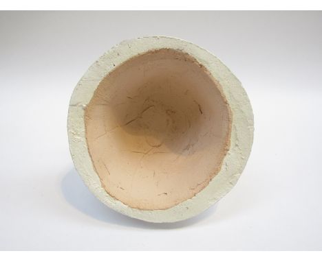 In the manner of Michael Flynn, a studio pottery ceramic sculpture of a nude woman atop a birthday cake. 17.5cm high