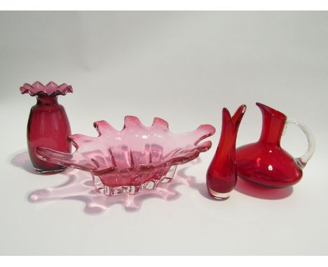 A collection of ruby and cranberry glass including Whitefriars jug and stem vase etc. Tallest 18cm (4)