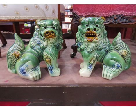 A pair of Chinese glazed ceramic Dogs of Fo figures, approx. 22cm tall