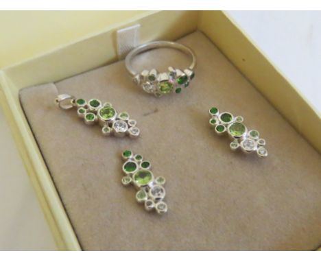 A suite of diopside peridot and zircon jewellery, ring, pendant and earrings, all stamped 925