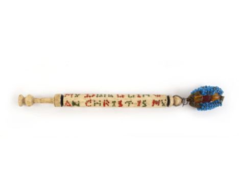 A 19th century bone bobbin reading 'Cranfield is my (?)Dixie Ling and Christ is my Salvation' together with a group of wooden
