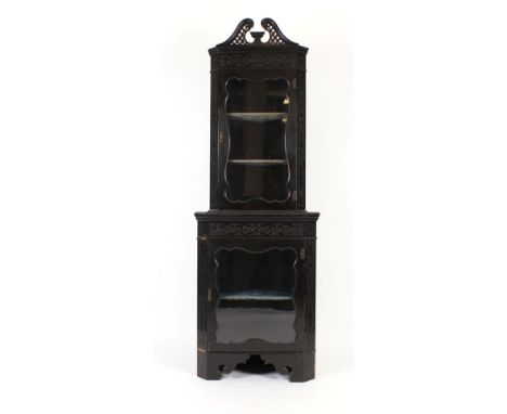 A late 19th century Aesthetic Movement glazed corner cabinet on bracket feet, w. 70 cm