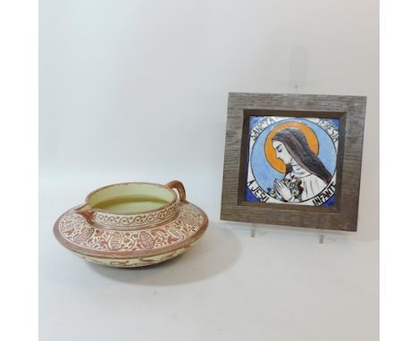 An Iznik lustre jug, together with a tile, framed, 19cm tall