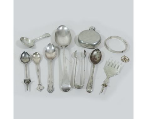 A collection of Masonic items to include a spoon, seal and flask, together with a George III silver caddy spoon and other sil