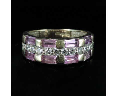 An 18 carat gold pink ruby and gemstone ring, boxed