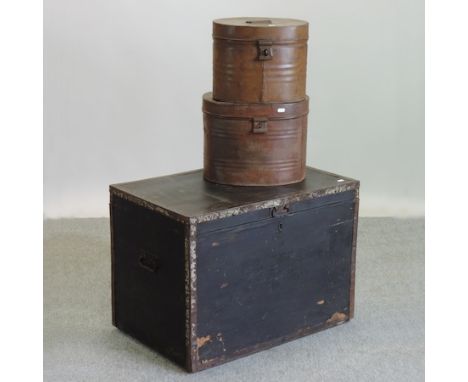 A black and metal mounted trunk, 77cm, together with two metal hat boxes