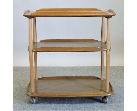 An Ercol light elm three tier trolley, 71cm