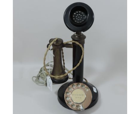 A 1920's bakelite stick telephone, 32cm