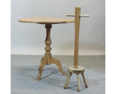 A pine circular tripod table, 70cm, together with a washing dolly