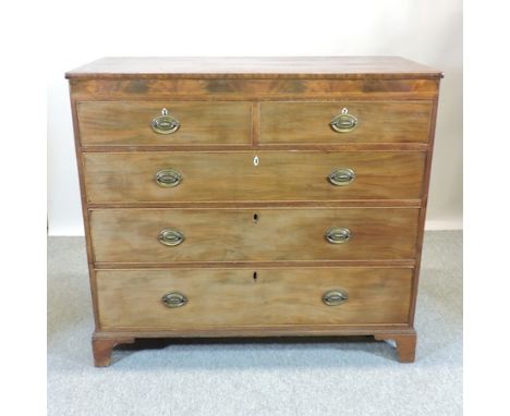 A George III mahogany, crossbanded and boxwood strung chest, on bracket feet, 122cm