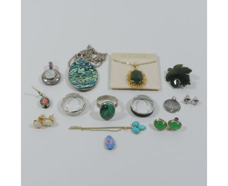 An Australian opal, unmounted, together with a malachite ring, turquoise stick pin, pendants and opal earrings