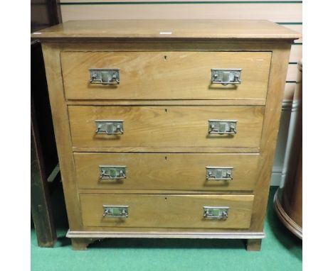 An Edwardian light oak chest, on bracket feet, 92cm