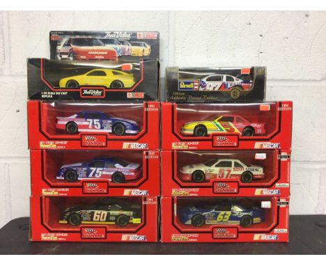 Group of model vehicles including Nascar Stock car replicas boxed, Corgi, Burago etc in three boxes.