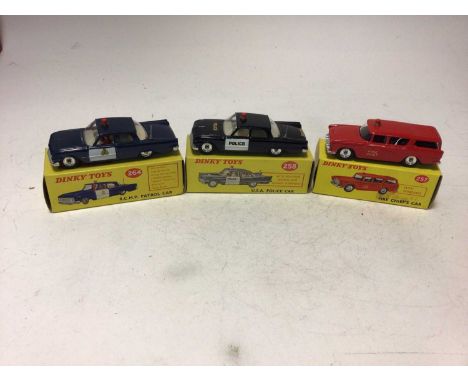 Dinky U.S.A. police Car No 258, R.C.M.P. Patrol Car No 264, Fire Chiefs Car No 257, all boxed (3)