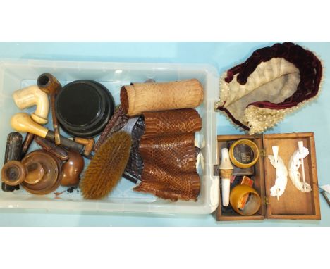 Two meerschaum pipes, a novelty pipe in the form of a shoe, a rolled snake skin, 200cm, a beaded and sequinned bonnet and oth
