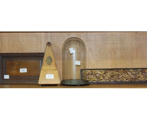 A small cedar wood tray, a Chinese gilt and lacquered furniture panel, 37 x 9cm, a French wood case metronome and a glass dom
