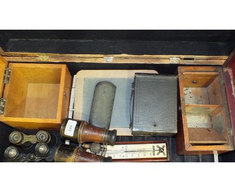 A pair of EK 6x9.3° binoculars no.134144, two other pairs of binoculars, a two-division wooden tea caddy, a stained wood box 