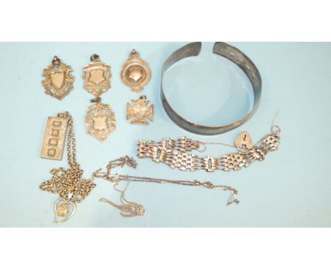 Four silver medallions, a silver ingot pendant on chain, a bangle and other silver jewellery, ___2.9oz, 90g. 