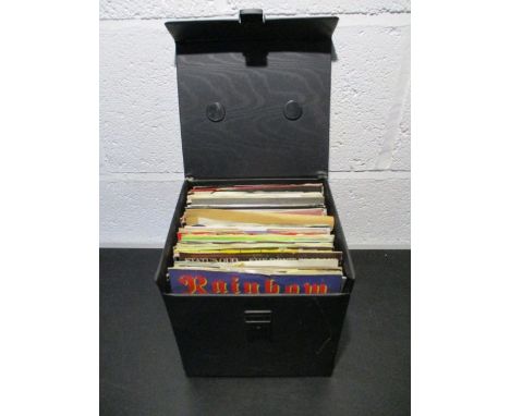 A carry case full of  7" vinyl singles including The Rolling Stones, Elton John, Status Quo, ELO, The Who, Wings, Rod Stewart