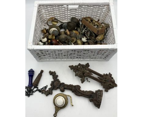 A collection of vintage and antique door furniture and fixings including handles, hinges, door knocker, ceramic pulls etc.
