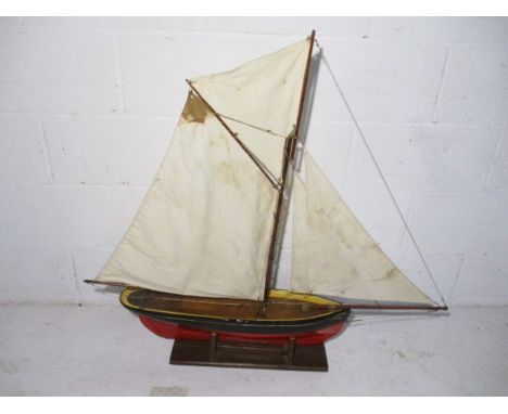 A vintage model sailing yacht on stand entitled "Otterford"
