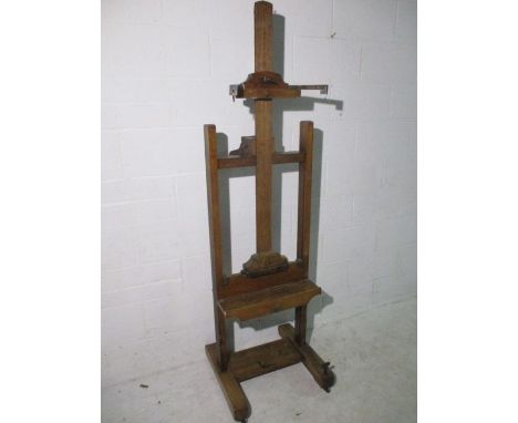 A Victorian adjustable oak artists easel. Makers plaque to reverse "Lechertier, Barbe &amp;Co" Wooden screw thread to back tu