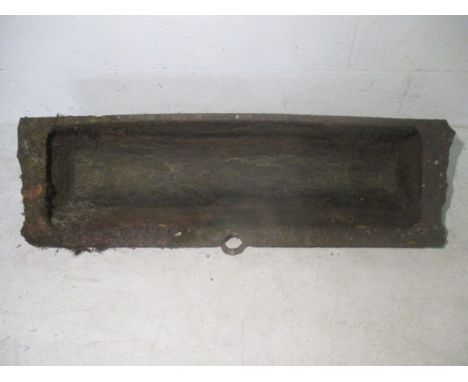 A cast iron trough.