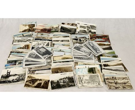 A collection of various vintage postcards along with a number of vintage photographs of various buses 