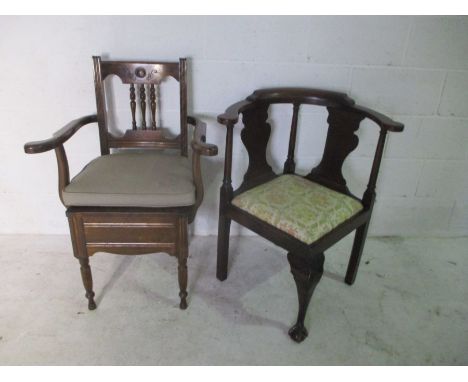 A mahogany corner chair on claw and ball feet along with an Edwardian commode