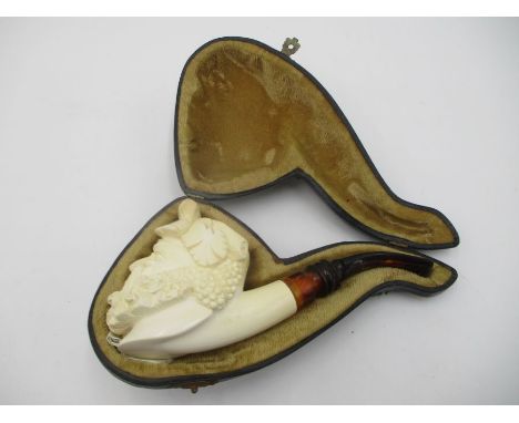 A cased Akdolu Meerschaum pipe carved in the form of Bacchus