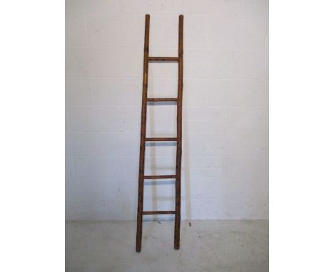 A bamboo ladder - height 187cm