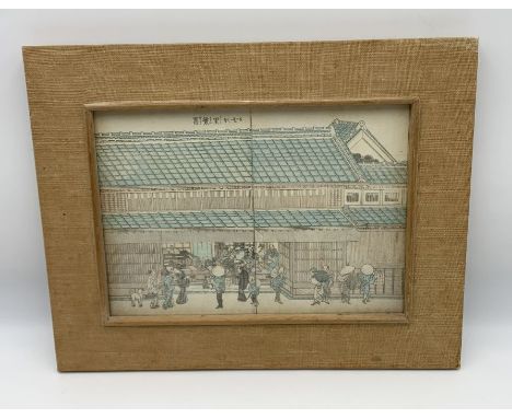 A small antique framed Japanese hand coloured print of a traditional scene