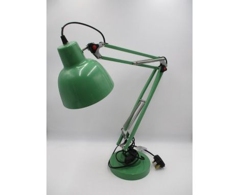 A modern green angle poise lamp