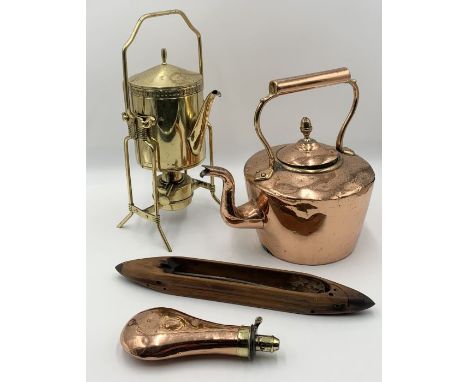 A small collection of brass and copper including a copper powder flask by Bartram &amp; Co.