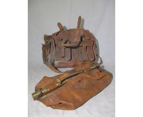 A vintage leather Gladstone bag along with a leather satchel